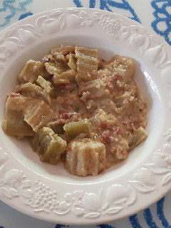 Una foto de 70. Cardo con jamón y almendras
