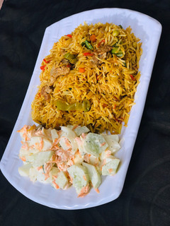 A picture of Chinese fried rice and cucumber salad.