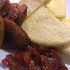 A picture of Fried Plantain And Yam With Sauce.