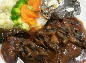 Una foto de Rib Eye en salsa de champiñones