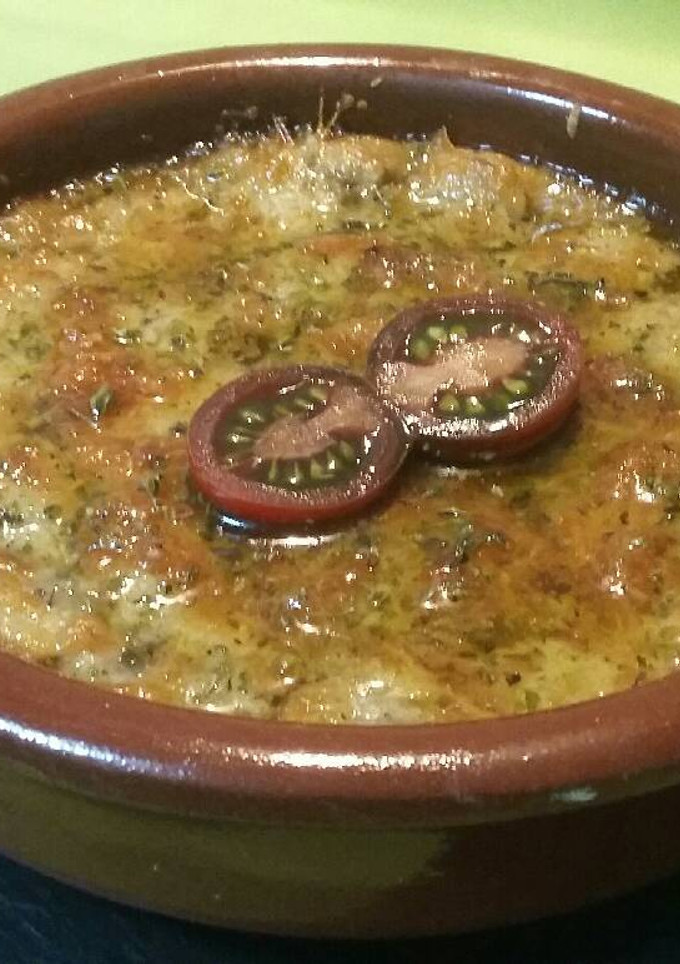 Una foto de Polenta con champiñones