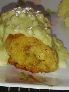 A picture of Baked cordon Bleu with creamy chicken corn sauce.