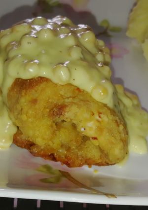 A picture of Baked cordon Bleu with creamy chicken corn sauce.