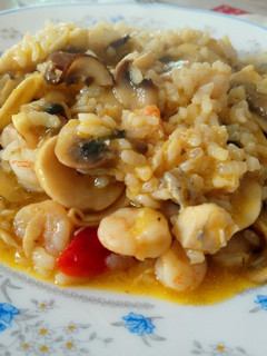 Una foto de Arroz meloso con rodaballo