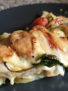 Una foto de Lomo gratinado con patatas y verduras
