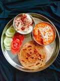 PUNJABI THALI (Shahi paneer,laccha paratha with Dahi Bhalla)