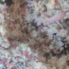 A picture of Steamed cous cous with minced meat.