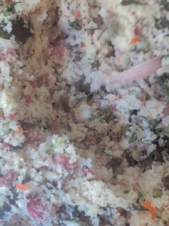 A picture of Steamed cous cous with minced meat.