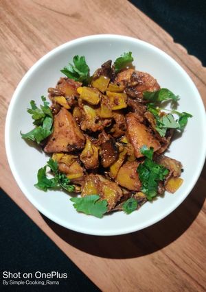 A picture of Sem Aloo with Kalonji Seeds.