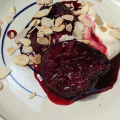 A picture of Baked plums w/ creme fraîche.