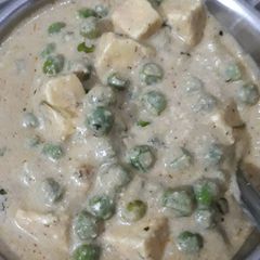 A picture of Creamy mutter Paneer without onion and garlic.