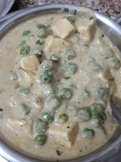 A picture of Creamy mutter Paneer without onion and garlic.
