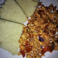 A picture of Fried Eggs with Ugali.