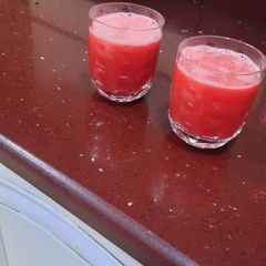 A picture of Carrot and orange juice.