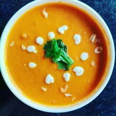 A picture of Caramelized Onion and toast tomato and carrot basil soup.