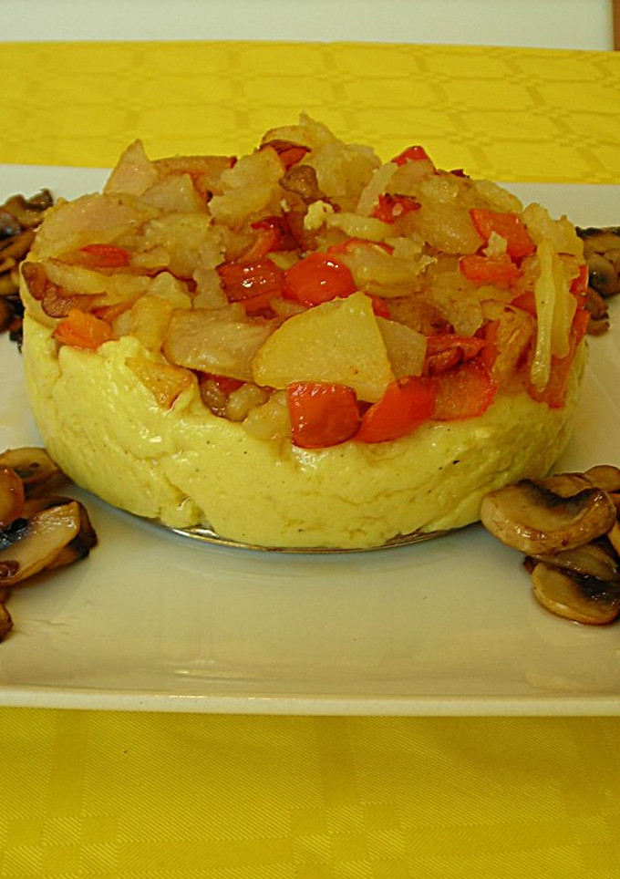 Una foto de Polenta con verdura salteada