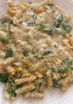 A picture of Spinach white sauce pasta.