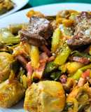 Salteado de alcachofas con ajos tiernos, bacon y foie