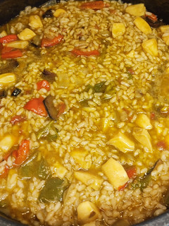Una foto de Arroz meloso con choco y calamares en su tinta