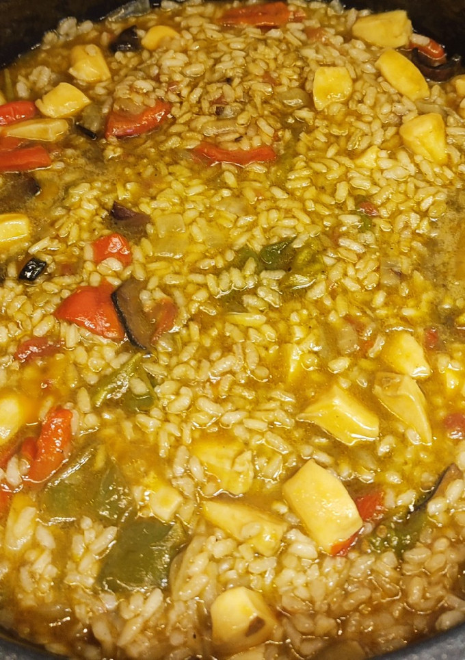Una foto de Arroz meloso con choco y calamares en su tinta