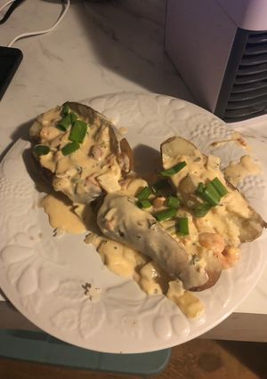 A picture of Cajun shrimp seafood stuffing for baked potatoes.