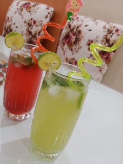 A picture of Mint and Strawberry Mojito 🍋🍓.