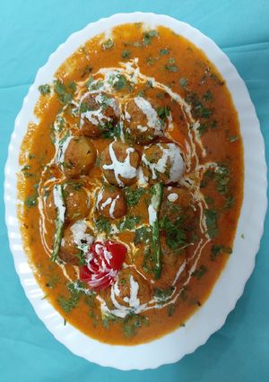 A picture of Paneer malai kofta.