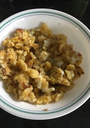 A picture of Cornbread and scrambled eggs.