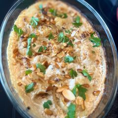A picture of Baked cauliflower with tahini sauce.