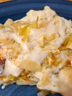 Una foto de Repollo gratinado con salsa blanca 🦭