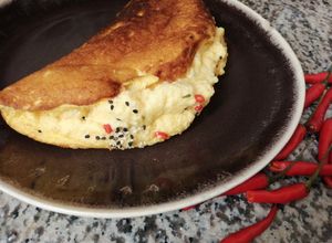 Une photo de Omellette soufflée piment de cayenne🌶️