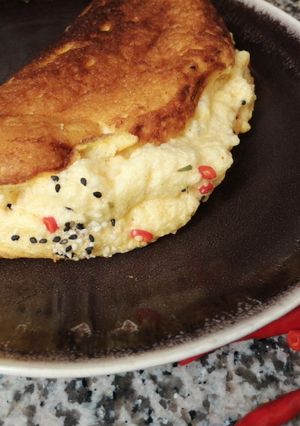 Une photo de Omellette soufflée piment de cayenne🌶️