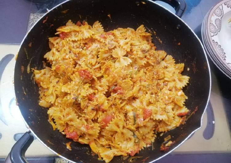 Step-by-Step Guide to Prepare Appetizing Cheesy Tomato Pasta Farfalle