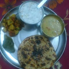 A picture of Urad daal with special roti.