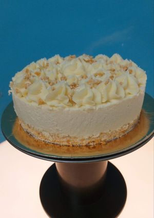 Una foto de Cheesecake de chocolate blanco y coco