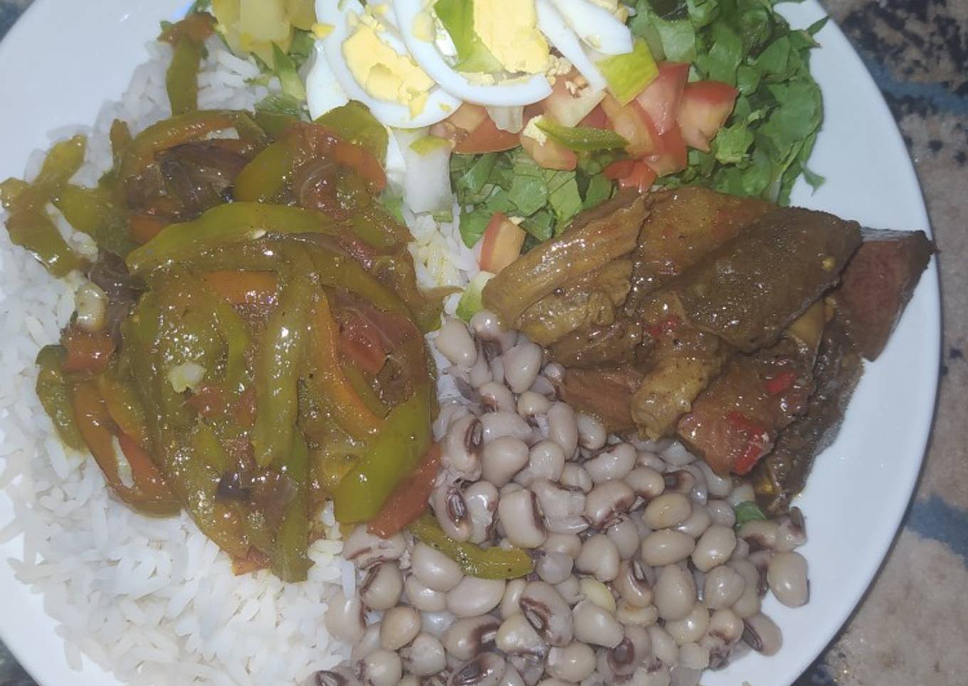 Rice and beans,salad,vegatable stir fry and beef sauce