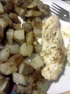 A picture of parmesan ranch chicken with roasted potatoes.