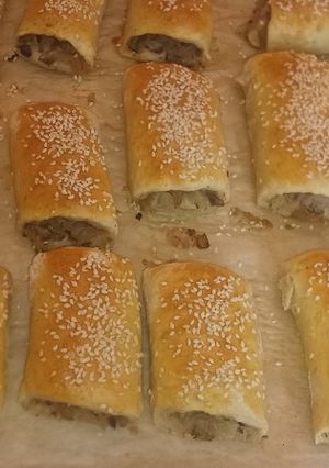 Zdjęcie przepisu Paszteciki z kapustą i pieczarkami.