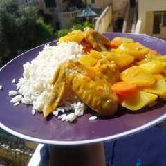 Una foto de Curry con pollo