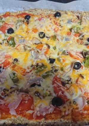 Una foto de Pizza base de pollo