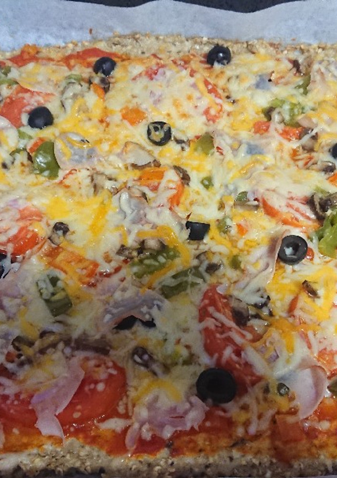 Una foto de Pizza base de pollo