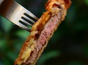 Una foto de escalope milanesa