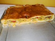 Una foto de pimientos morrones rellenos