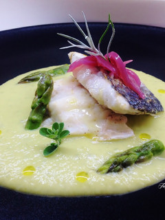 A picture of Sea Bream with Asparagus Sauce and Sweet and Sour Red Onion.