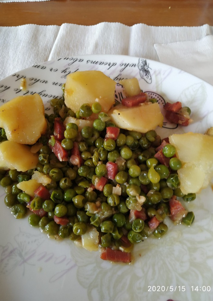 Una foto de Guisantes salteados con jamón en olla GM