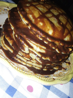 A picture of Pancakes in Chocolate Syrup.