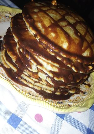 A picture of Pancakes in Chocolate Syrup.