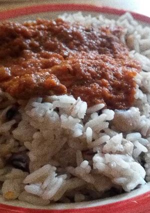 A picture of White rice,bean and Stew.