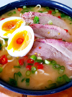 A picture of Pork Ramen Noodles with Miso Soup.