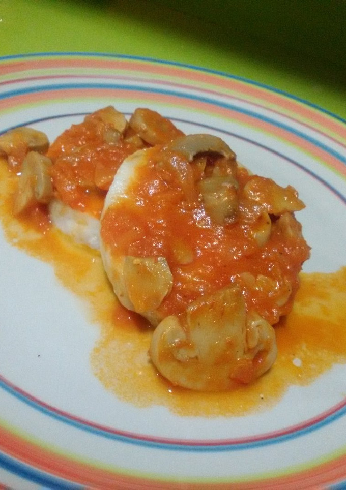 Una foto de Medallones de merluza con tomate con Thermomix